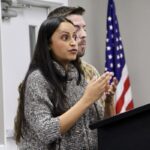 Naveela Philbeck leveled damaging allegations of discrimination and retaliation at Union County Schools, pictured here with her husband Simon in last week’s School Board meeting. Photo by Shawn Jarrard