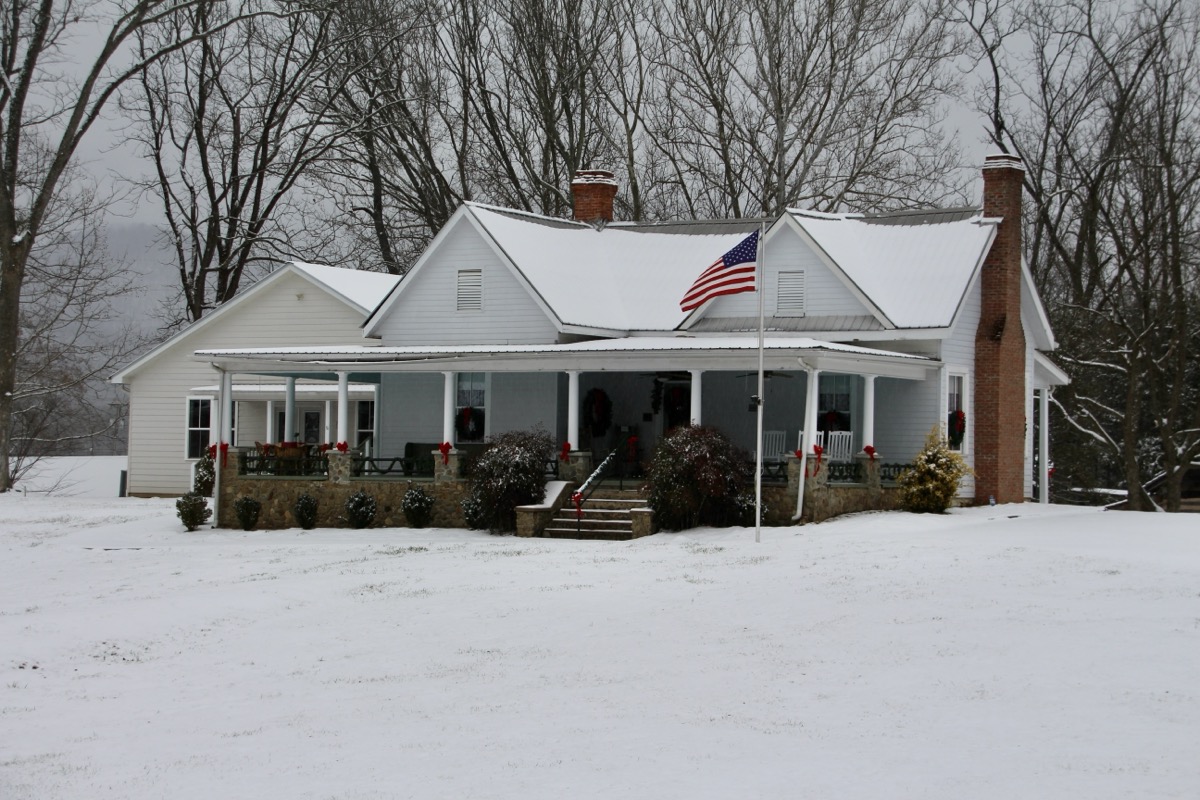 Friday produced many picturesque scenes around town, including at the Mountain Life Museum of the Historic Butt-Mock House. Photo by Shawn Jarrard
