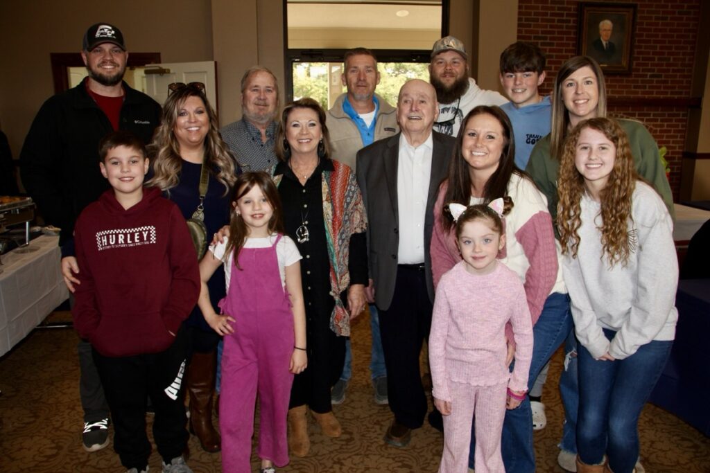 Mayor Jim Conley enjoyed the company of multiple generations of family members alongside the dozens of friends who attended his Feb. 22 retirement party. Photo by Shawn Jarrard
