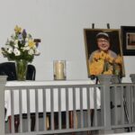 Allyson McGraw’s portrait accompanied a lovely bouquet of flowers during a Celebration of Life in honor of her passing in December. Photo by Brittany Holbrooks