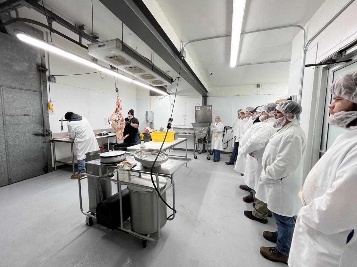 TCHS Animal Science students suited up for their recent tour, following strict safety and sanitation protocols that are in place to protect workers, consumers, and the animals themselves.
