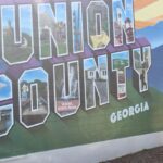 Not only is Blairsville’s own Jake Gooch of goochandfifty.com a local history buff, he’s also a preservationist with a business that gives to the Union County Historical Society. Photo by Brittany Holbrooks