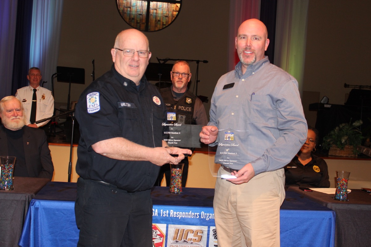 Last week, David Ueltzen of Fire Station No. 4 and Jimmy Nichols of Fire Station No. 2 accepted appreciation awards for their respective stations’ fundraising efforts for local first responders on behalf of UCGA1R. Photo by Brittany Holbrooks