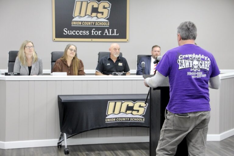 School Custodial Supervisor Mark Hughes delivering public comments in the March 18 Board of Education meeting. Photo by Shawn Jarrard