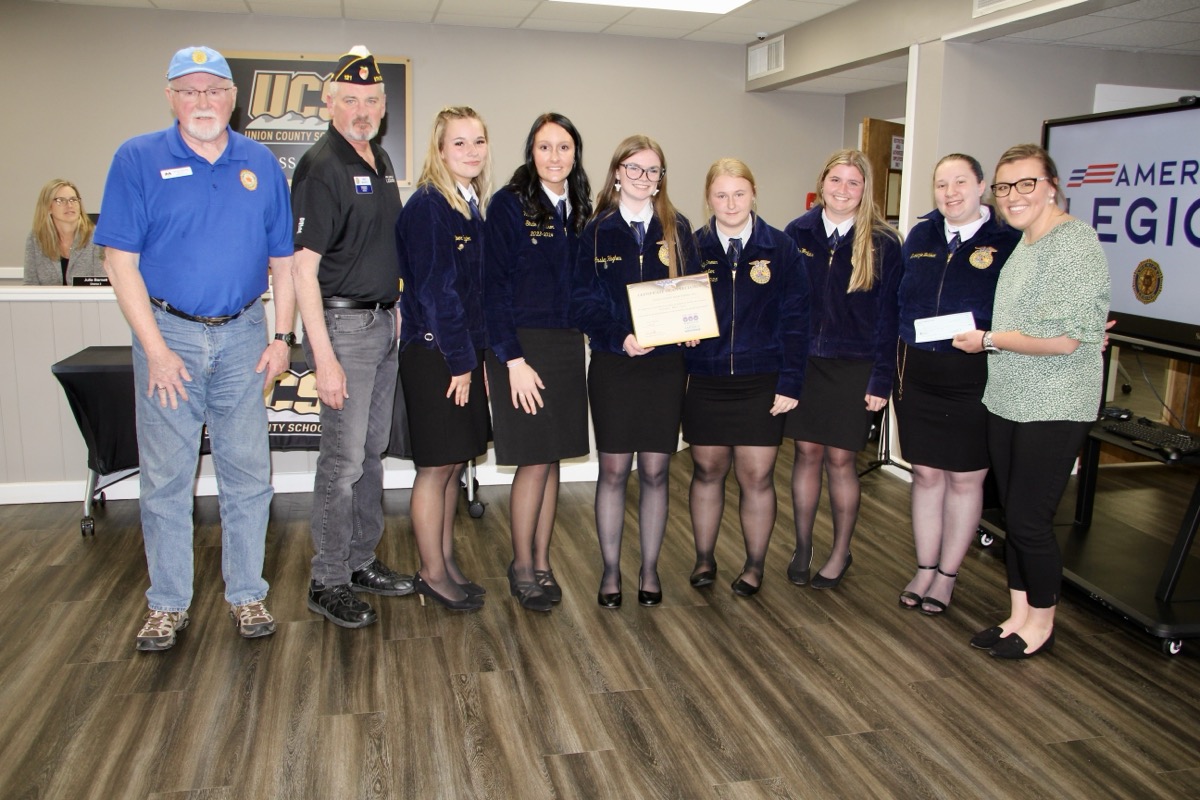 American Legion also presented a certificate and donation to UCHS FFA. (L-R) David Patterson, Mike Merritt, Piper Taylor, Kaitlynn Janes, Ansley Hughes, Emily Brown, Amber Watkins, Mackenzie Baldwin and Katie Rittenhouse. Photo by Shawn Jarrard