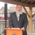 Rabbi Yonatan Hambourger of Chabad Rural Georgia delivered a moving speech at the Children’s Daffodil Garden Dedication in the park behind Blairsville City Hall March 4. Photo by Brittany Holbrooks