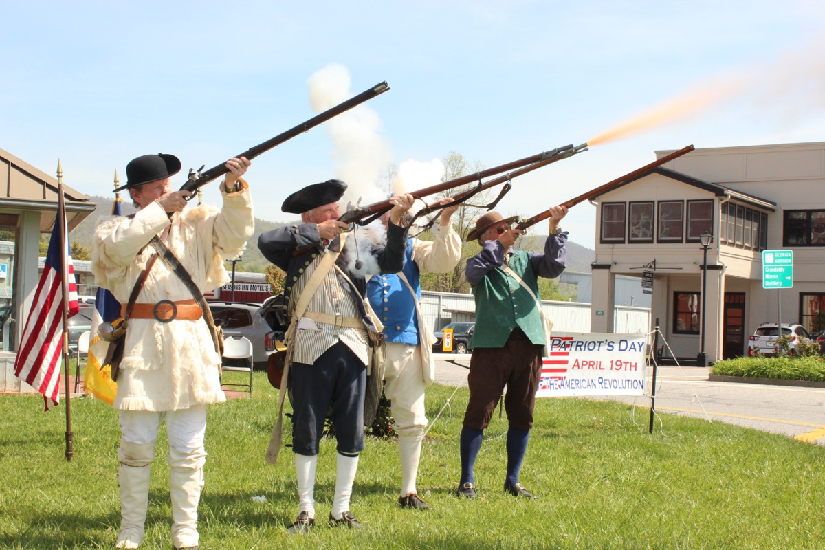 Musket fire is always an exciting part of the annual Patriots’ Day observance. Photo by Brittany Holbrooks