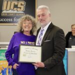 Retired educator Donna Towery has received a Partner in Education Award for her positive energy, ongoing care for students and faculty, and overall unwavering support of Union County Schools, pictured here with Dr. David Murphy. Photo by Shawn Jarrard