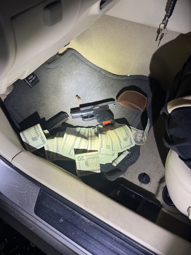 A loaded pistol and over $1,500 in counterfeit $20 bills were confiscated after a drug investigation that led to a vehicle chase this month.