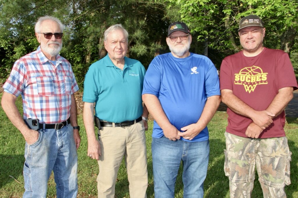 (L-R) Mickey Cummings, Frank Riley, Harold Collins and Dustin “Rog” Rogers are excited for the June 7 ribbon cutting at the new Butternut Creek Trail, on the opening day of the Union County Farmers Market. Photo by Shawn Jarrard