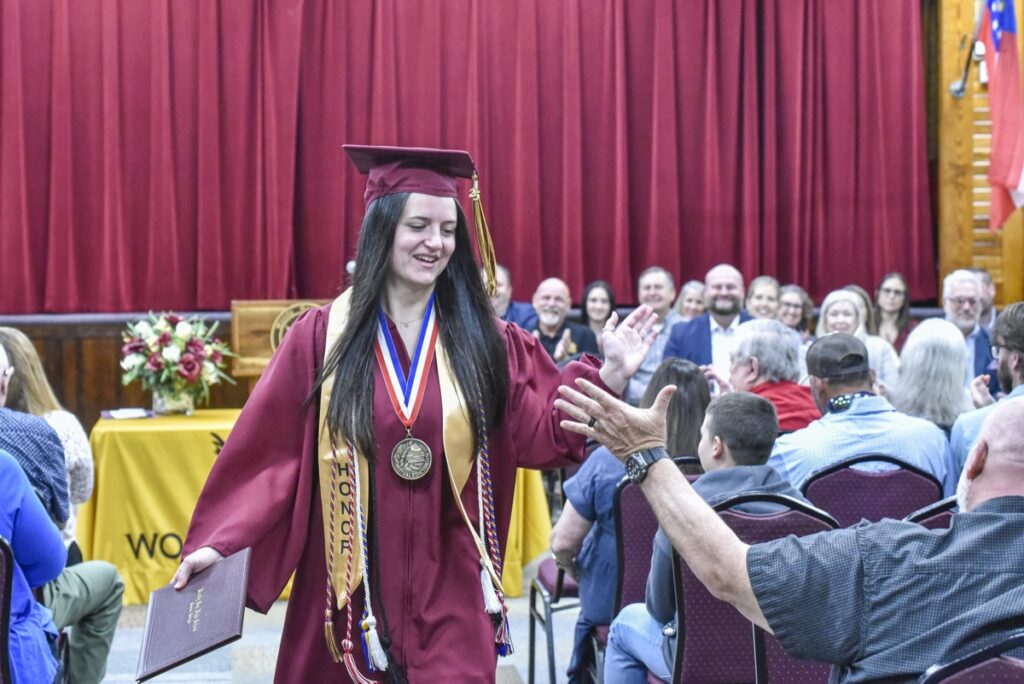 Woody Gap School Valedictorian Mia Roberts celebrating during her solo commencement exercises on Saturday. Photo by Todd Forrest