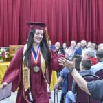 Woody Gap School Valedictorian Mia Roberts celebrating during her solo commencement exercises on Saturday. Photo by Todd Forrest