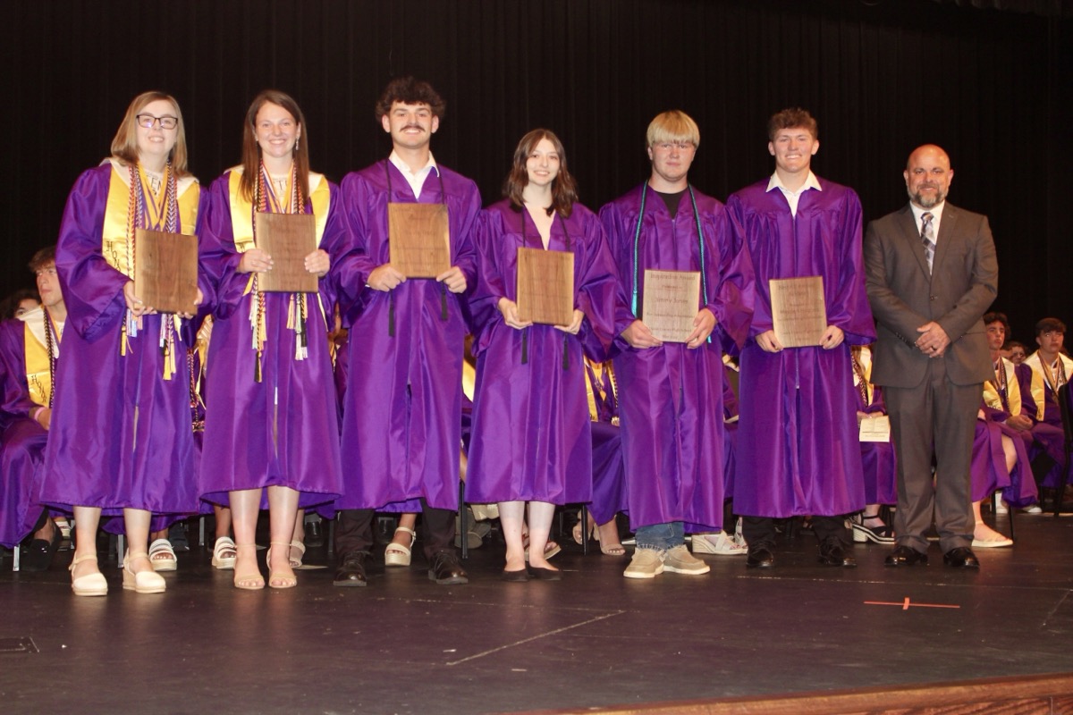 Several outstanding seniors received wooden plaques crafted by the UCHS construction and engineering labs. Photo by Brittany Holbrooks