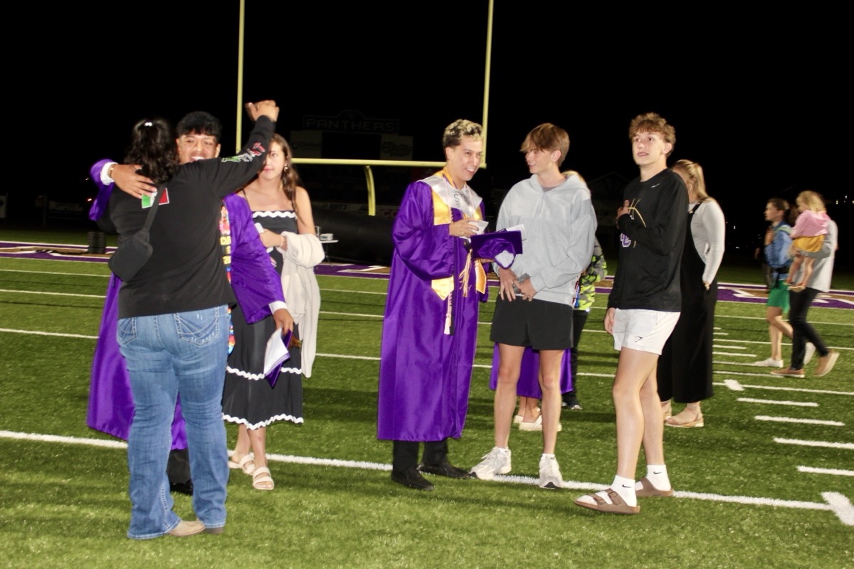 Families and friends were proud of their graduates on Friday, with everyone joining together in celebration after the Senior Class video and fireworks display. Photo by Brittany Holbrooks