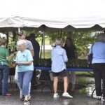 Attendees of United Community’s Customer Appreciation Day braved the elements Friday to pick up free tomato plants, as well as hotdogs, sodas and T-shirts courtesy of the bank.