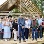 The Collins Family and others came together to dedicate the donation and restoration of the Collins Cabin for ongoing preservation by the Union County Historical Society. Photo by Lowell Nicholson