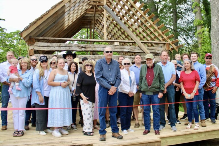 The Collins Family and others came together to dedicate the donation and restoration of the Collins Cabin for ongoing preservation by the Union County Historical Society. Photo by Lowell Nicholson