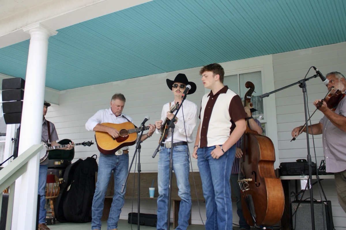 The Collins Family Band was a big hit at the Collins Cabin dedication and ribbon-cutting ceremony on May 24. Photo by Lowell Nicholson