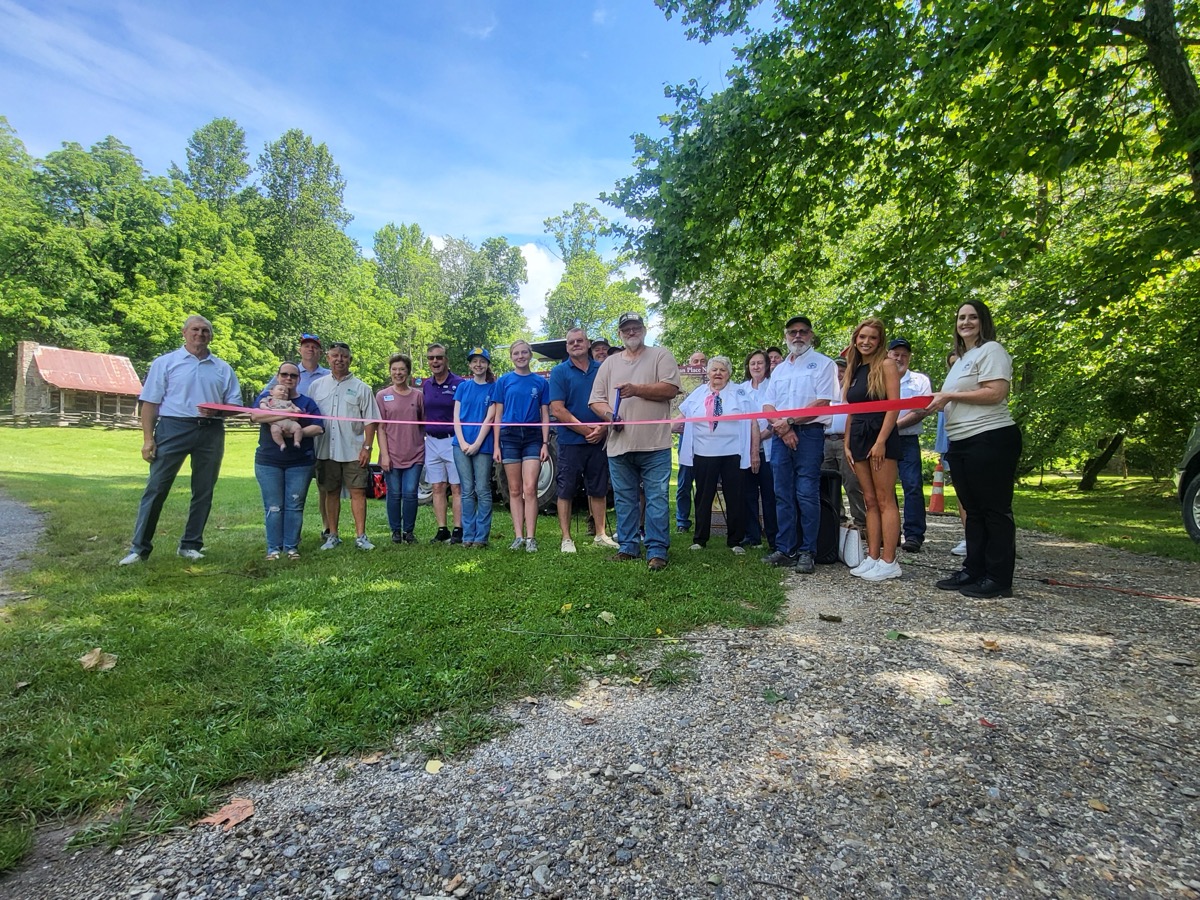 Local stakeholders celebrated a June 7 ribbon-cutting ceremony for the new Butternut Creek Trail, which connects nicely with the historical preservation efforts at the Farmers Market. Photo by Todd Forrest