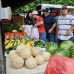 Freddie Collins and his Family Farm know how to keep customers happy at the Union County Farmers Market, pictured here Saturday. Photo by Lowell Nicholson