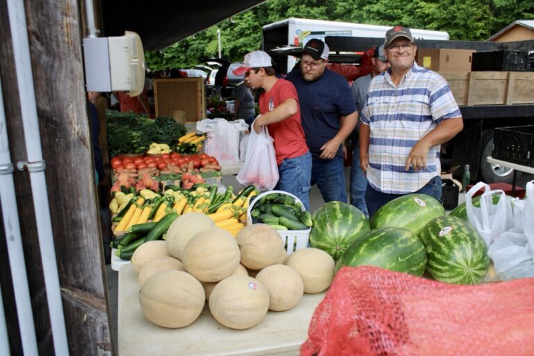 Freddie Collins and his Family Farm know how to keep customers happy at the Union County Farmers Market, pictured here Saturday. Photo by Lowell Nicholson