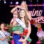 2024 Miss Georgia Mountain Fair Rylee Kitchens crowning a new Queen of the Fair for 2025, Amelia Kenlee Shook of Towns County. Photo by Lowell Nicholson