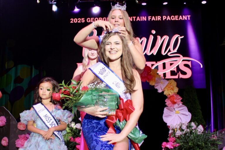 2024 Miss Georgia Mountain Fair Rylee Kitchens crowning a new Queen of the Fair for 2025, Amelia Kenlee Shook of Towns County. Photo by Lowell Nicholson