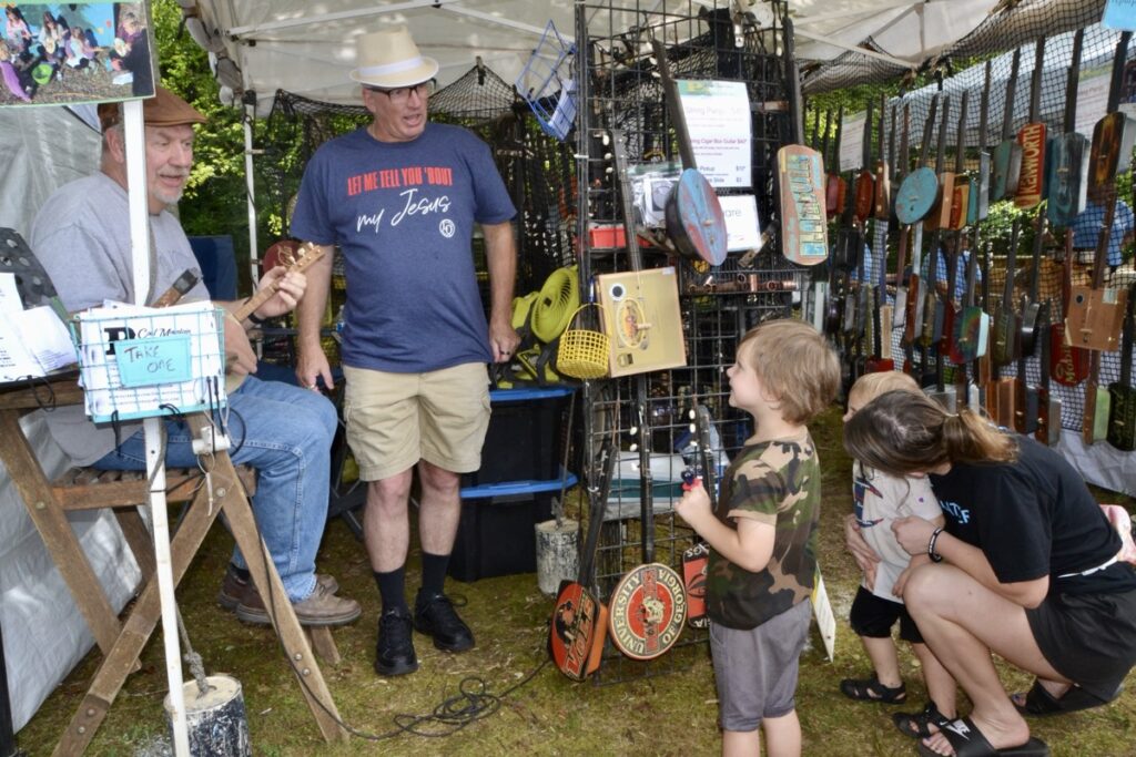 Coal Mountain Panjo sold and played their handmade instruments to the delight of 2025 Butternut Creek Festivalgoers. Photo by Brittany Holbrooks