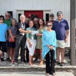 Isaiah 117 House recently met with generous community members to receive a donation benefitting the local nonprofit. Photo by Brittany Holbrooks