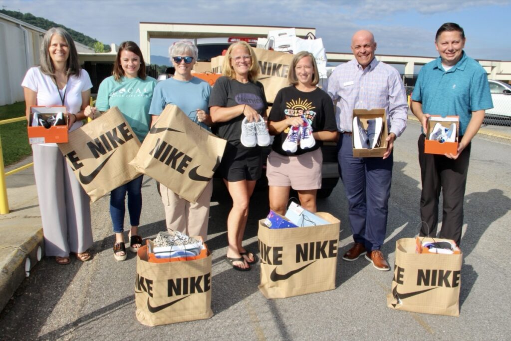(L-R) School Social Worker Amy Rogers, Katie Mashburn of River City, Dawn Sharp of Family Connection, Becky Tracy of Family Connection, Katy Jones of Family Connection, Scott Nanney of River City and Jonathan Jones of River City. Photo by Shawn Jarrard