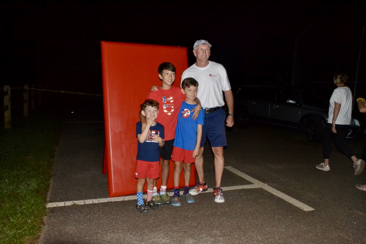 Pictured here with Chamber President Steve Rowe, the Worsham Boys played a key role in the Fourth of July fireworks this year, pulling the switch to spark them off at 9:20 p.m. Friday. Photo by Brittany Holbrooks