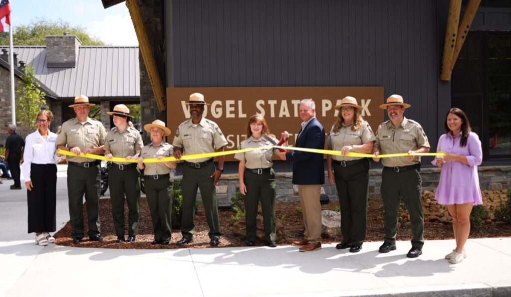 Park rangers and community members gathered at Vogel State Park’s new visitor center on Thursday, Aug. 7, for a ribbon-cutting ceremony. Photo by Daysha Pandolph