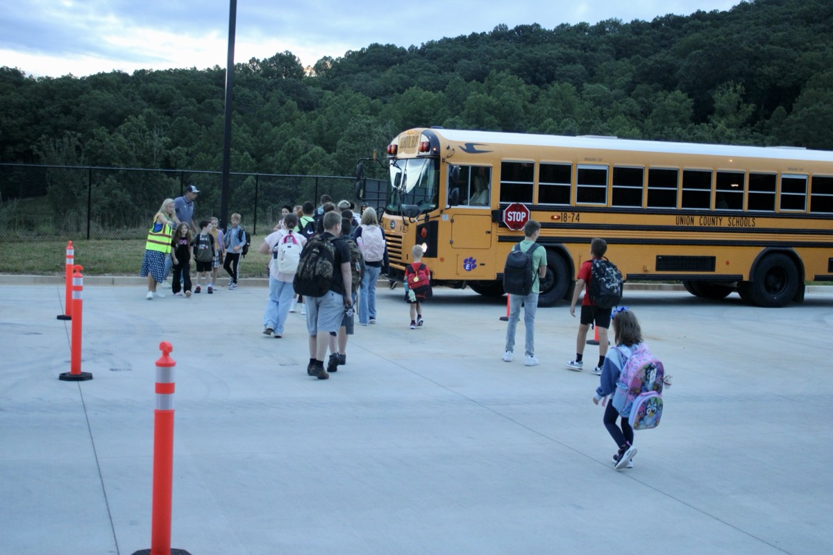 Students unloading from buses bright and early on their first day back at Union County Elementary on Wednesday, Aug. 6. Photo by Lowell Nicholson