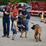 Kids and other members of the public enjoyed meeting Suches Firefighter Chris Disser’s friendly pooch Mack during the annual Open House earlier this month. Photo by Brittany Holbrooks