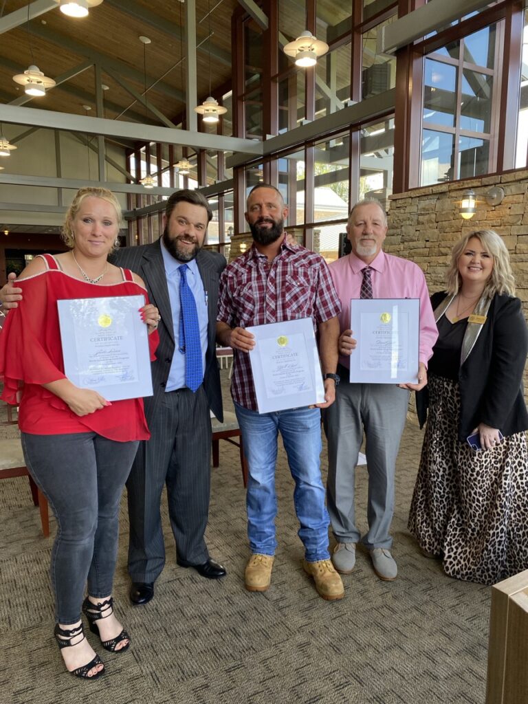 (L-R) NEDC Graduate Sheila Larson, Judge Buck Levins, Graduate Robert Byrd, Graduate David Goyette and Program Coordinator Tashina Eller at the graduation ceremony on Sept. 11. Photo by Samantha Laratta