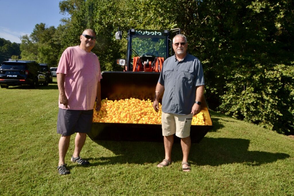 Police Chief Baxter and Sheriff Dyer exchange their usual uniforms for shorts during the annual Duck Derby, held this year on Saturday. Photo by Brittany Holbrooks