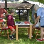 Among the many things to do at this year’s Mountain Heritage Festival, the age-old pastime of checkers provided families with a fun activity that was popular with the area’s forebears. Photo by Brittany Holbrooks
