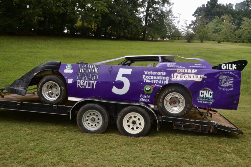 Positive Pathways Executive Director Shawna Harkins represents hope even in her off time, driving this racecar designed specifically to bring awareness to the plight of those suffering from addiction and mental health problems. Photo by Brittany Holbrooks