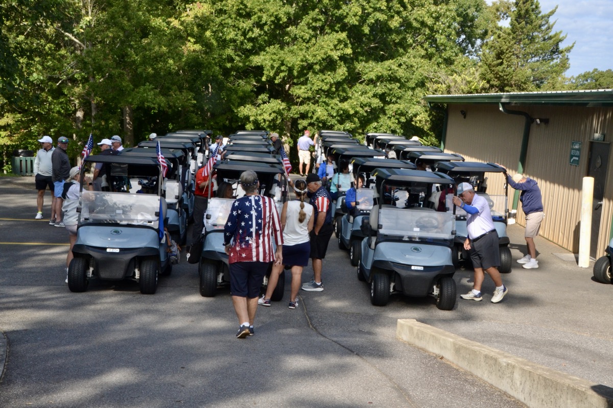 The 28 teams that registered for Putting with Patriots couldn’t wait to get started on the green of Butternut Creek Golf Course last week. Photo by Brittany Holbrooks