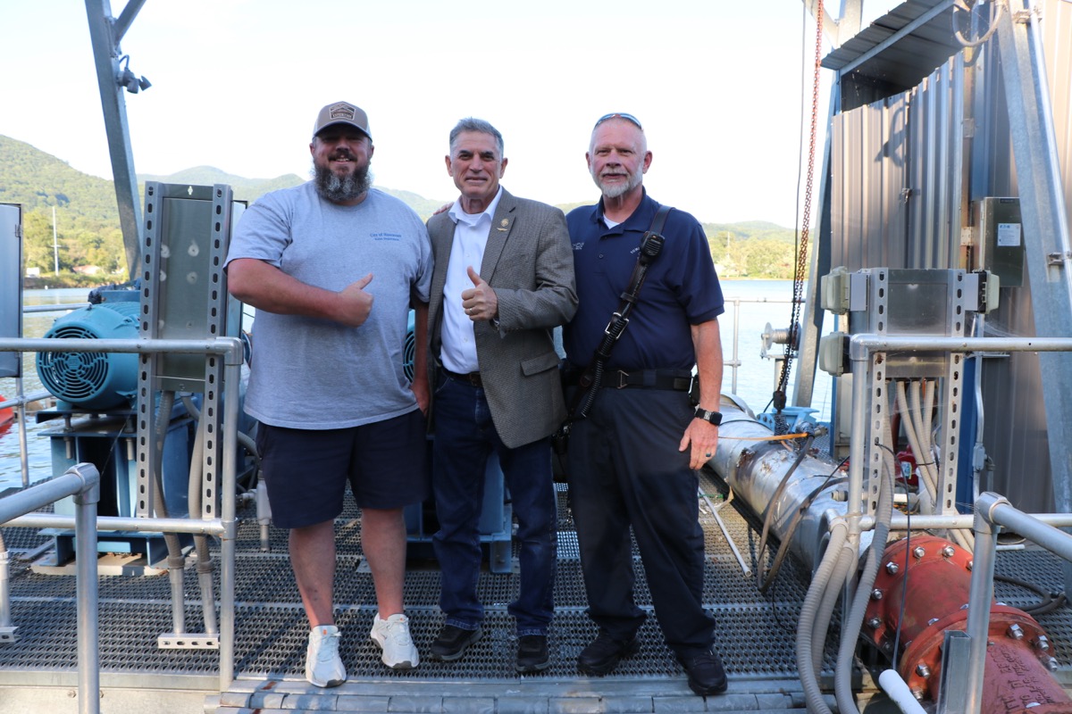 Rep. Clyde, center, with Hiawassee Water Department Supervisor Andrew Sims and Hiawassee Mayor Jay Chastain Jr. during the congressman’s lake facilities tour Aug. 26. Photo/Submitted