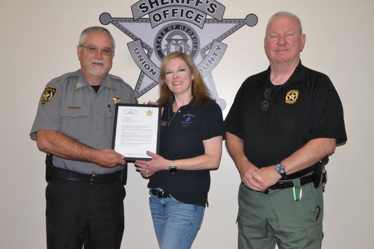 On Aug. 26, Ashley Conley received a special commendation on behalf of TechWizards of Blairsville, presented by UCSO Sgt. Bob Calamari and Sheriff Shawn Dyer. Photo by Brittany Holbrooks