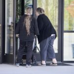 Two of the 484 local voters who cast ballots through Week 1 of early voting, pictured here at the Voting Center. Photo by Shawn Jarrard