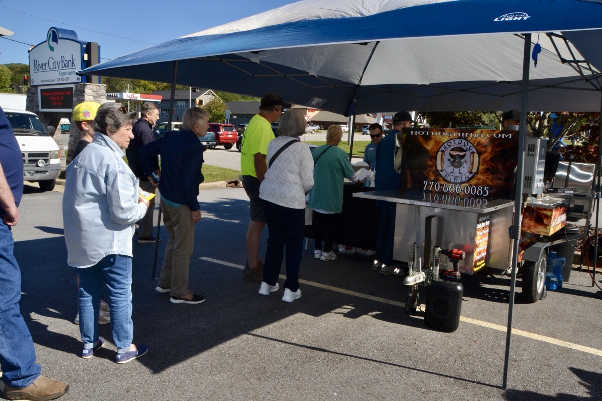 On top of lunch catered by the popular Hotdog Ninja, River City employees handed out a ton of gifts – T-shirts, coin purses, seat cushions, fun foam fingers and more – and hosted a raffle for a “Mega Football Tailgate Cooler” filled with all kinds of free goodies.
