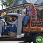 Junior Bridges, pictured here with wife Carolyn, led the inaugural Sorghum in the Mountains Festival Parade as Grand Marshal, which was fitting, as he helped found the original festival back in 1969. Photo by Brittany Holbrooks