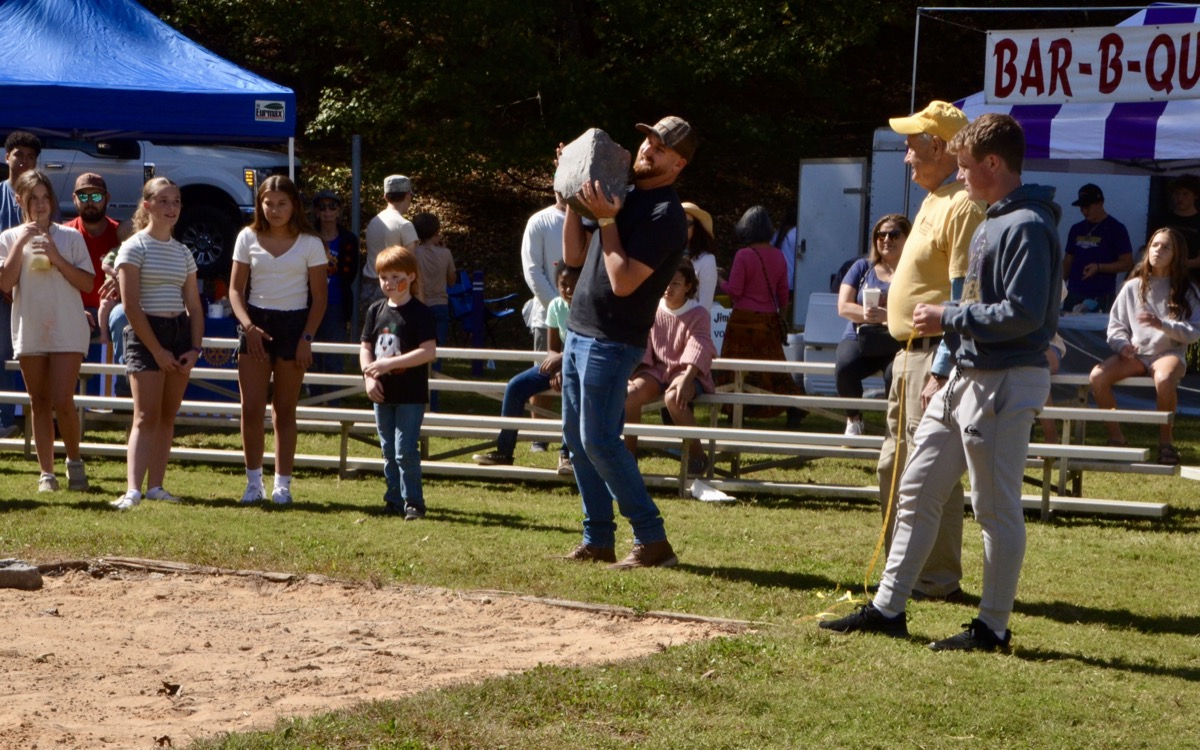 Stone Throwin’ was just one of the many agriculturally symbolic games available for free participation by festival attendees over the weekend. The games will continue Oct. 18 & 19! Photo by Brittany Holbrooks