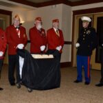 MCL Detachment #783 preparing for the ceremonial cake-cutting in the annual birthday ball celebrating the Marine Corps. Photo by Brittany Holbrooks