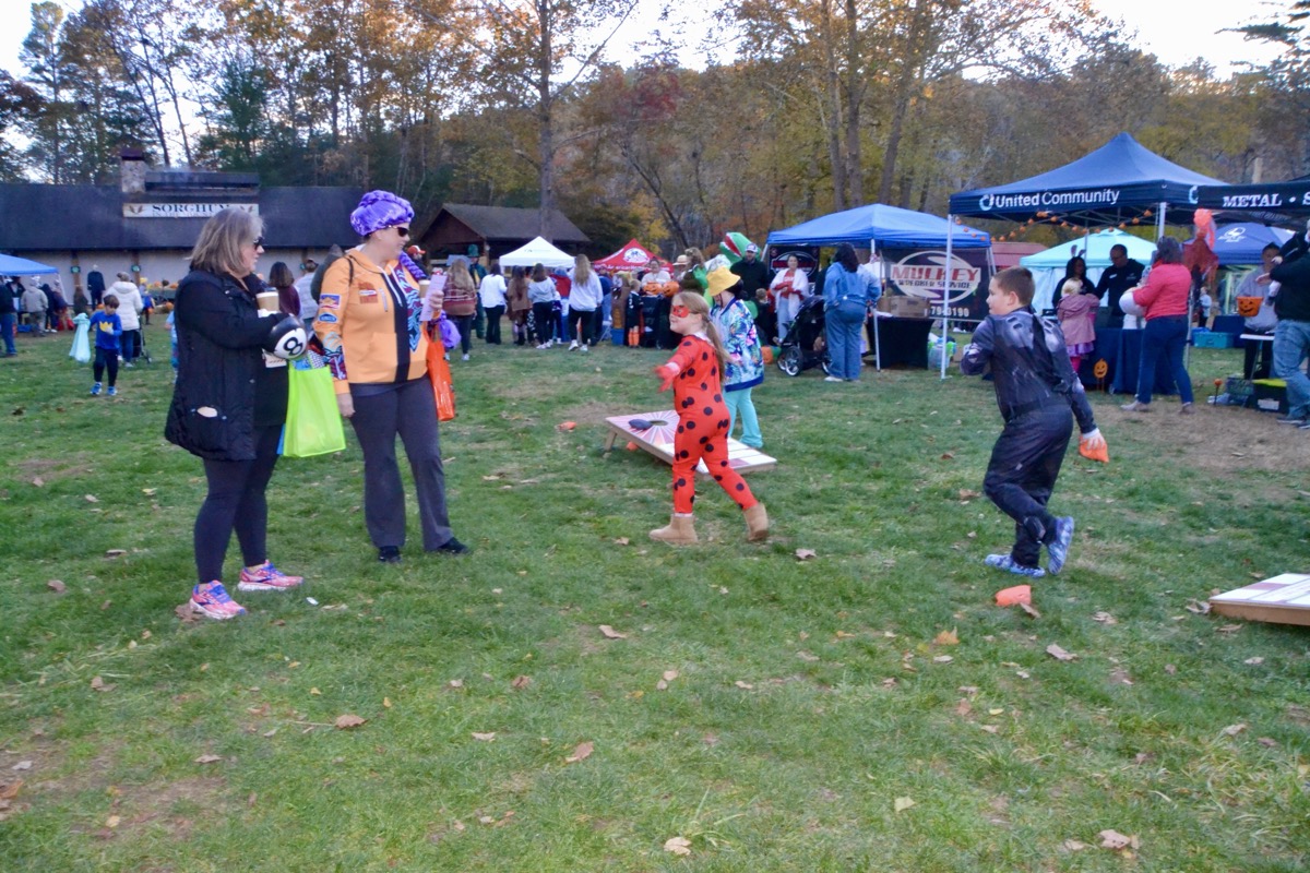 Cornhole was a popular activity at the Boo Bash, which featured thousands of visitors collecting candy and having a costumed good time. Photo by Brittany Holbrooks