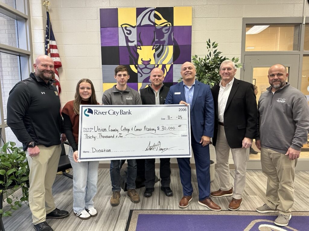 River City Bank was happy to meet with school officials and students last week to present a $30,000 donation benefitting the Union County College & Career Academy.
