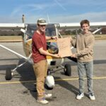 (L-R) Flight Instructor Jason Hinson with Sawyer Alexander after the young man’s first solo flight Nov. 15.