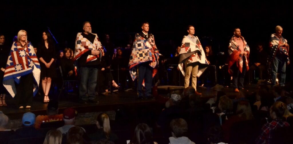 Students of Union County Schools presented six local veterans with Quilts of Valor during an emotional ceremony at the Fine Arts Center on Nov. 12. Photo by Brittany Holbrooks